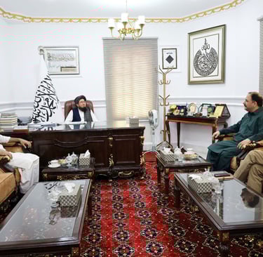 Federal Minister Mustafa Kamal with Afghan Consul General Syed Abdul Jabbar Takhari at polio eradication meeting in Karachi