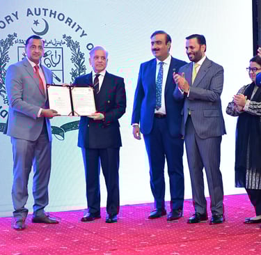 DRAP officials with PM and Health Minister during system launch