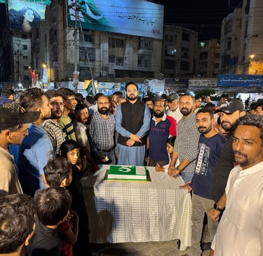 Engineer Syed Usman hoisting Pakistan’s national flag in Ward 09 Gulistan-e-Johar Independence Day celebration