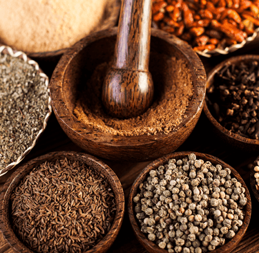 a variety of spices and spices in bowls
