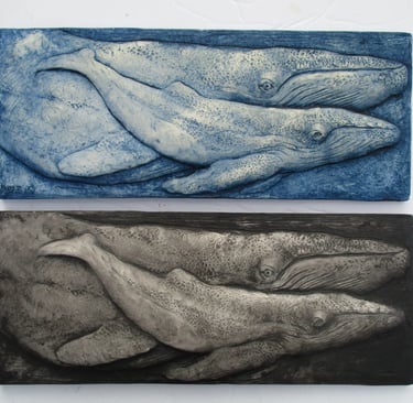 two paintings of whales and a whale and a whale
