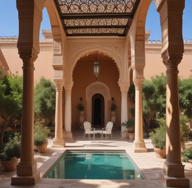 A picturesque villa with two tall, elegant towers located on a lush, green cliffside overlooking a serene body of water. The villa is partially covered in climbing vines, adding to its charm. Mature trees surround the property, providing shade and natural beauty. The sky is clear, contributing to the tranquil ambiance.