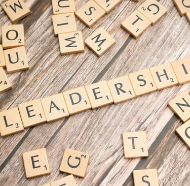 A scrabble board spelling LEADERSHIP