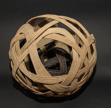 woven sphere black and white contained basket within a basket orb sculpture woven art contemporary complex
