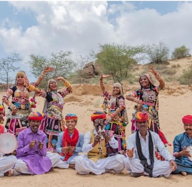 a group of people in traditional indian clothing
