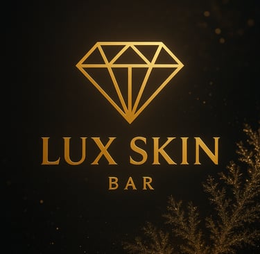 a gold and black logo for a lux skin bar