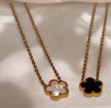 Clover necklaces in different colours. 