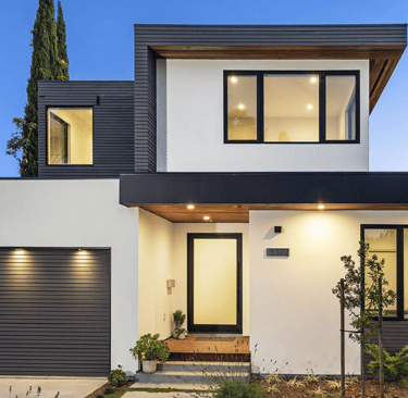 Custom home framing with engineered beams and open-concept design.