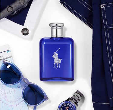 Ralph Lauren Polo Blue cologne bottle on white background with men's fashion accessories.
