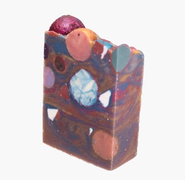 a soap bar with a colorful swirly swirly soap photographed on a white background for e-commerce