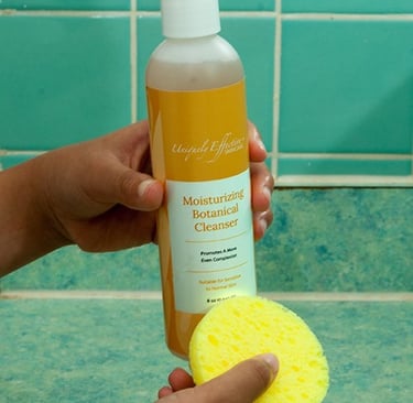 a person holding a moisturizing conditioner and a sp sponge pad