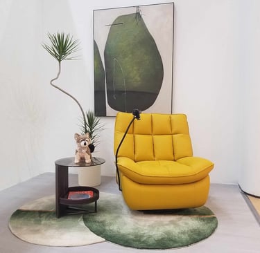 a yellow chair with a plant in the middle of it