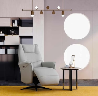 a reclining chair with a table and a lamp