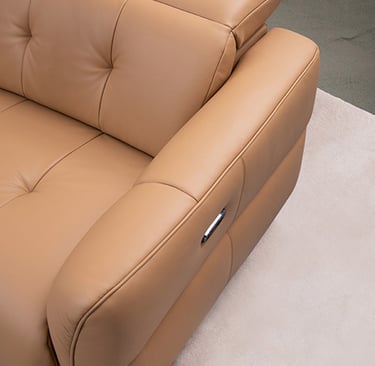 a couch with a leather couch and a chair