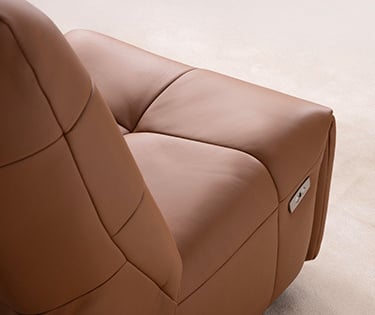 a brown leather reclining chair with a brown leather reclining chair