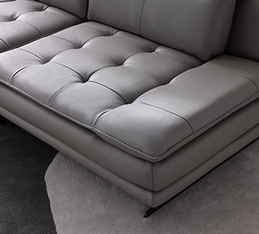 a couch with a large couch and a rug