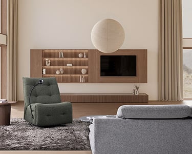 a living room with a couch and a chair