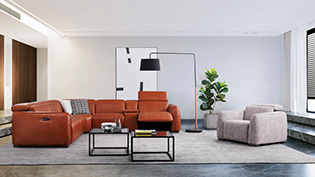 a living room with a couch and a chair