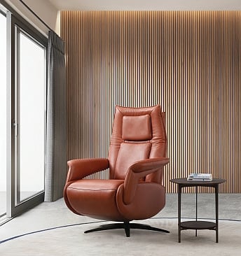 a chair with a table and a table with a glass of wine