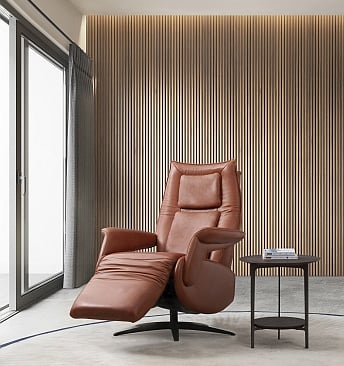 a reclining chair with a reclining chair in a room