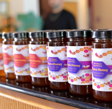a row of jars of honeycomb honey