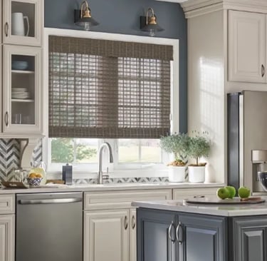 kitchen with woven wood shades above sink and modern cabinetry – Rise Up Window Coverings Milwaukee
