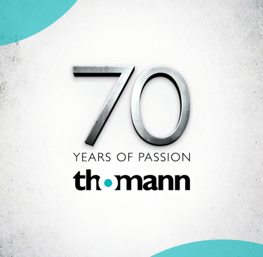 a logo of thomann 70 years of passion