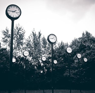a clock tower with clocks on each of it