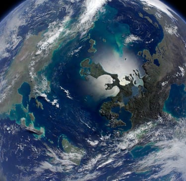 A high-resolution satellite view of Real Earth showing continents, blue oceans, and white clouds.