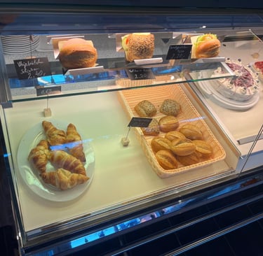 a display case with pastries of pastries and pastries
