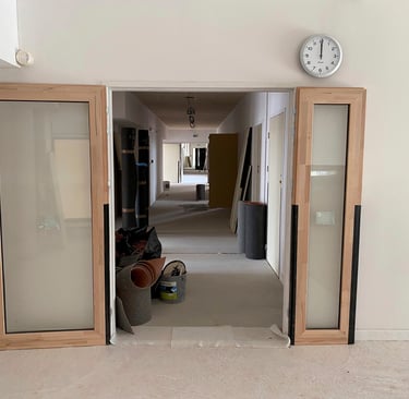 Porte en bois faite par Laroux Menuiserie