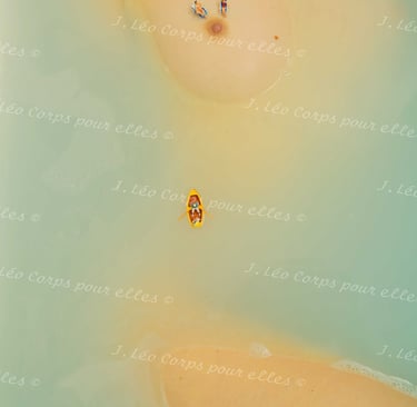 a couple of people are sitting on a beach