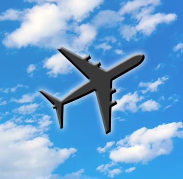 Aeroplane Symbol on Blue Sky with Clouds