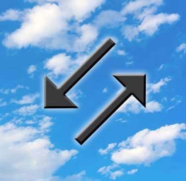 Opposite Arrows on Blue Sky with Clouds