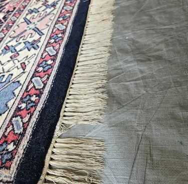 Oriental Wool Rug fringes needing correction, showing the majorcontrast between dirty and clean