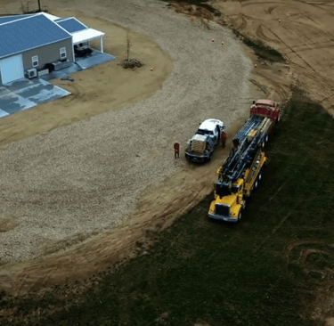 well drilling trucks at site