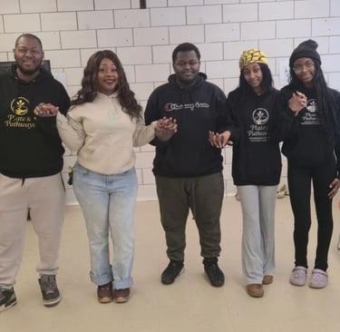 Plate & Pathways founder Alicia Spradley and her family volunteering at a food drive event