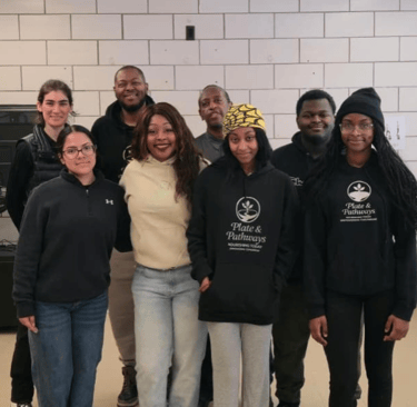 Plate & Pathways volunteer group photo from the 2025 Winter Wrap-Up food and clothes giveaway
