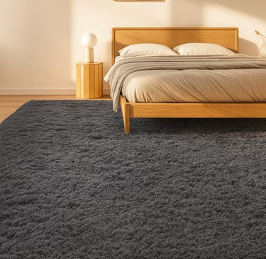 dark gray textured oversized rug under a wooden bed in a cozy bedroom setting