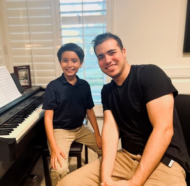 Daine Jordan with 8 year old piano student Matteo