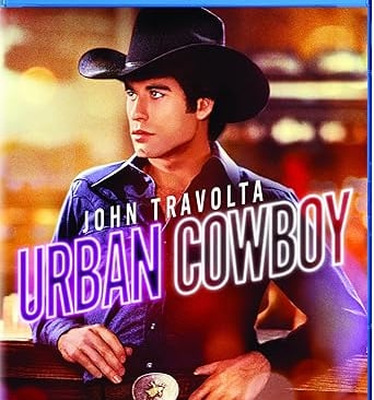 a man in a cowboy hat and a cowboy hat