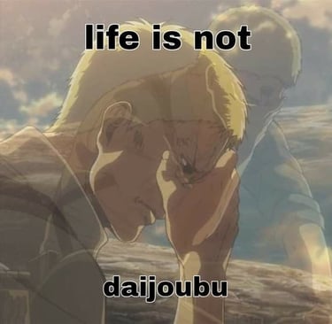 Reiner Braun with his head in his hands. Captioned life is not daijoubu