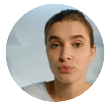 Young women headshot, with light brown hair pulled back.
