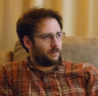 Travis relaxing at home.