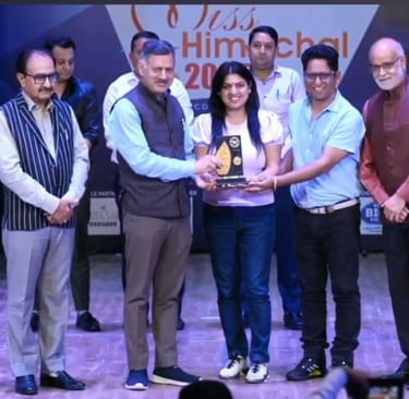 Award by State minister to Dr Neetika and Dr Vikas