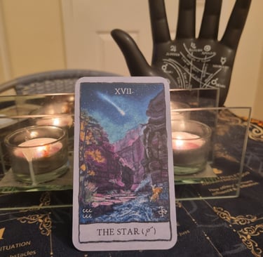 the star tarot card, ornamental hand, candles