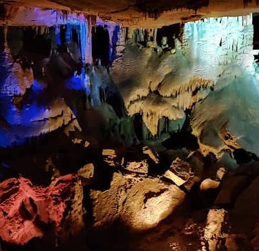 Chattanooga, TN - Raccoon Mountain Caverns colored light displays is spook-tacular beautiful