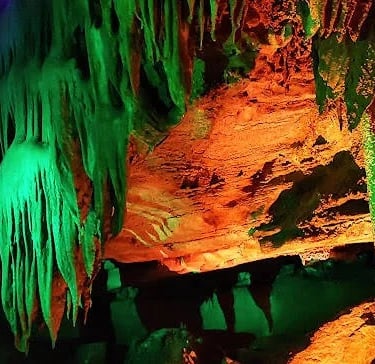 Chattanooga, TN - Colored lights display the stalagmites & stalactite formations at Raccoon Mountain