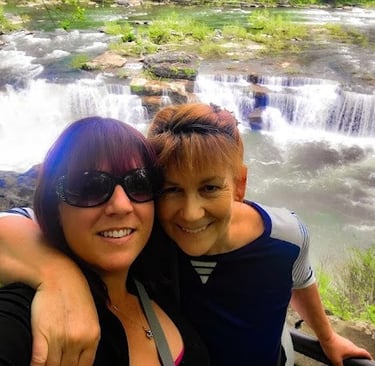 Rock Island Park, TN - Mom & daughter in front of Great Falls, a wide "U" shaped waterfall
