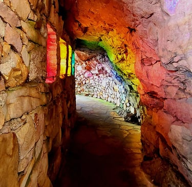 Lookout Mtn, GA - Rock City's magical Rainbow Hall is brilliantly lit up in color